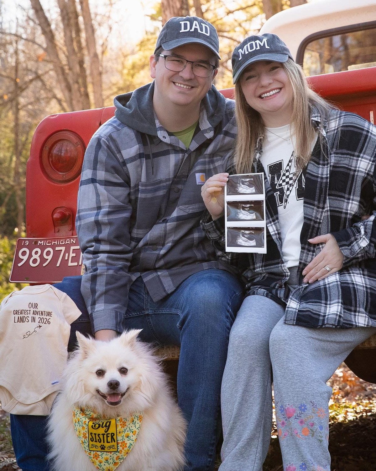 James Reif and his wife outdoors by a vintage truck